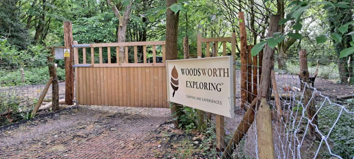 Entrance gate and Woodsworth Exploring sign